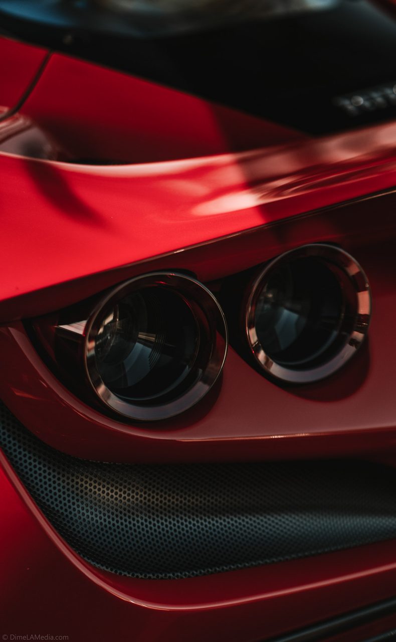 Close detail of a red Ferrari F8 tail light cluster