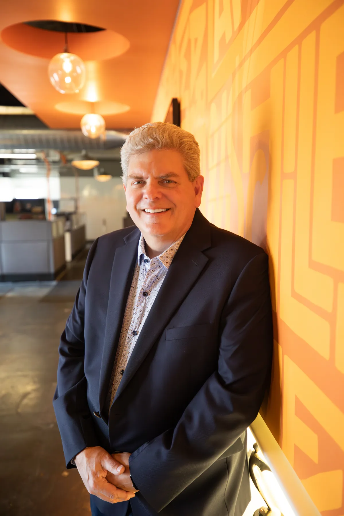 John Pohlman, co-owner of Lawrence & Schiller, photographed in the agency office in Sioux Falls SD