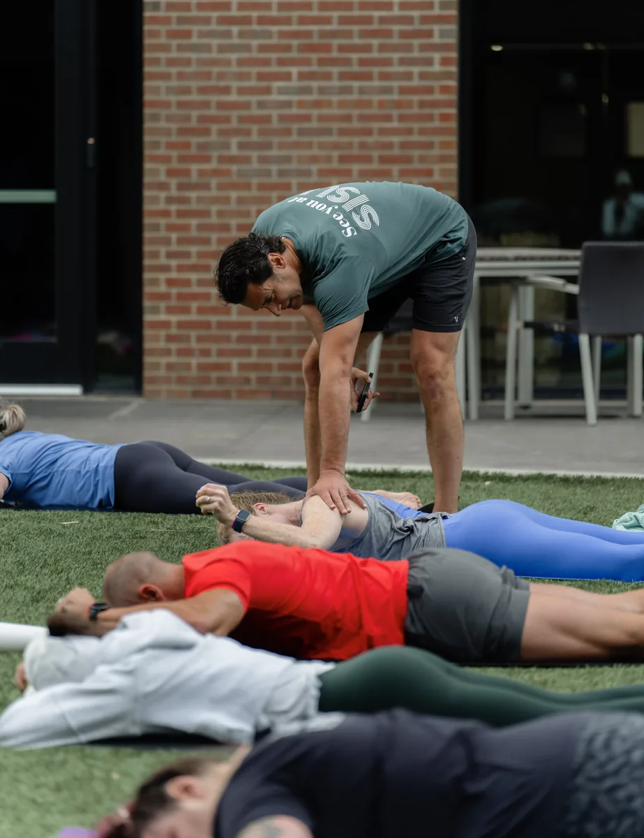Outdoor Kinstretch class hosted by Sisu and Pomegranate Market, photographed by Lloyd Duimstra at Cherapa Place in downtown Sioux Falls SD