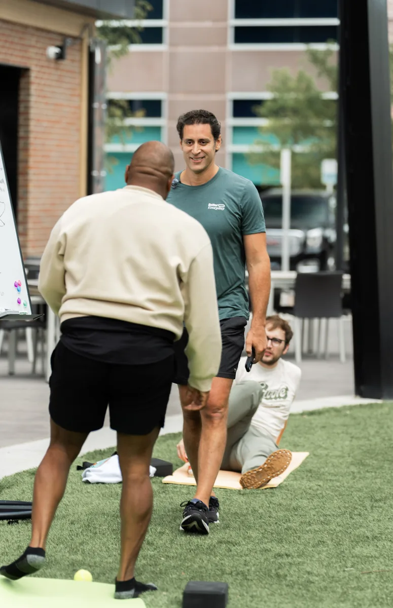 Outdoor Kinstretch class hosted by Sisu and Pomegranate Market, photographed by Lloyd Duimstra at Cherapa Place in downtown Sioux Falls SD