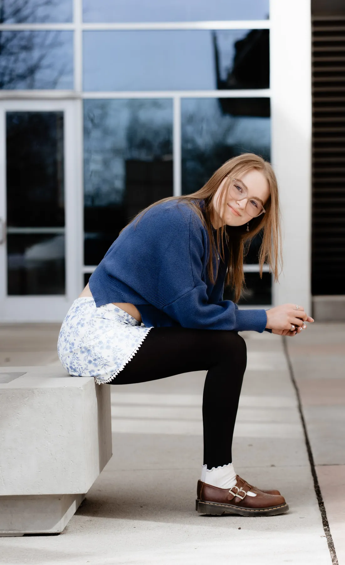 Syd Patzwald senior portrait on a downtown bench, Sioux Falls SD