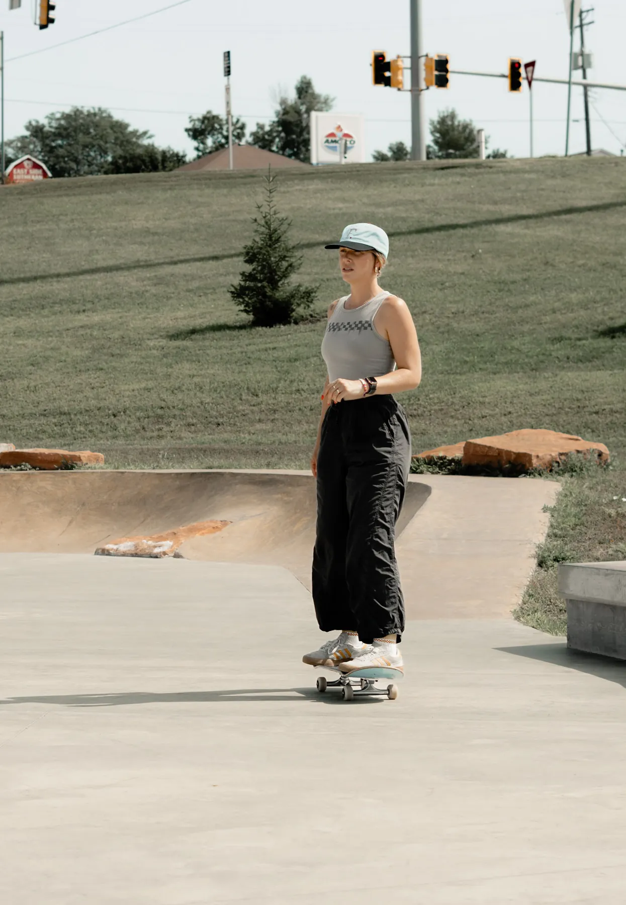 Skater carving the deep end of the bowl