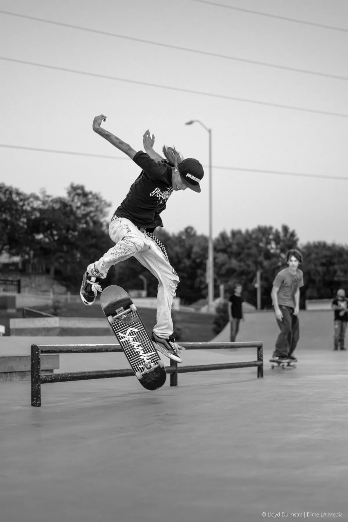 Skater blasting out of the bowl, action photography
