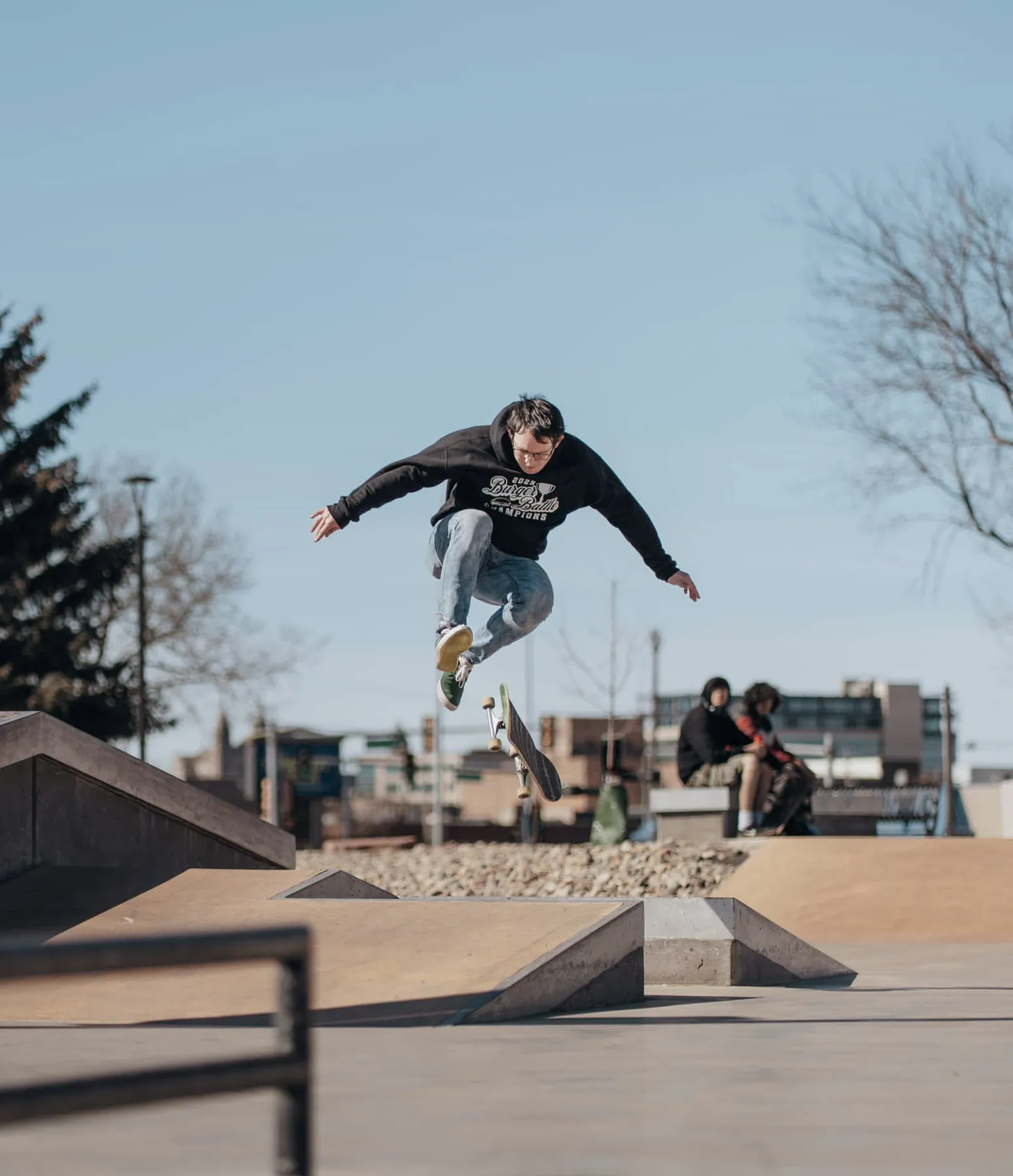 Skater floating a trick above the coping