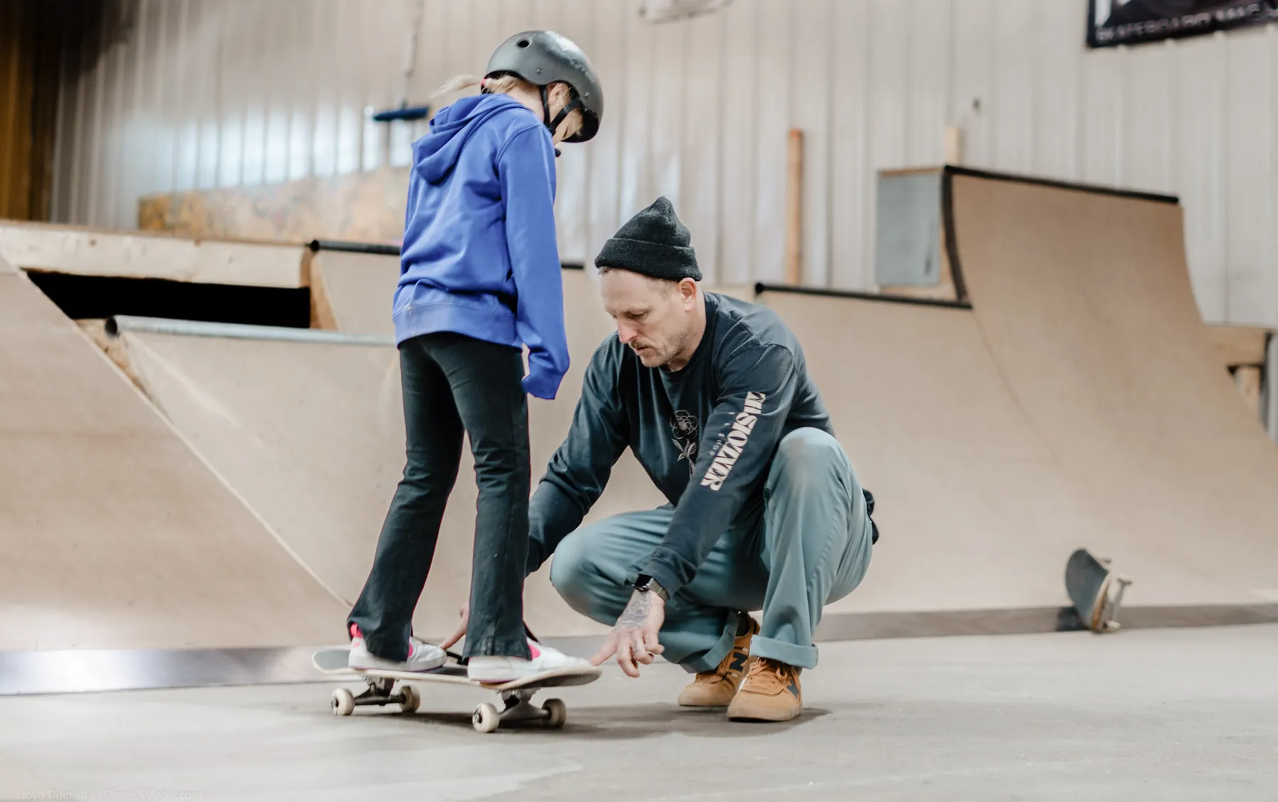 Indoor skateboarding lesson at a Sioux Falls skatepark