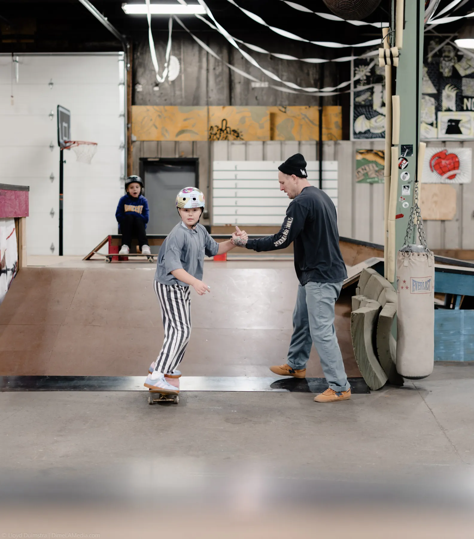 One-on-one skate lesson inside a Sioux Falls skate barn
