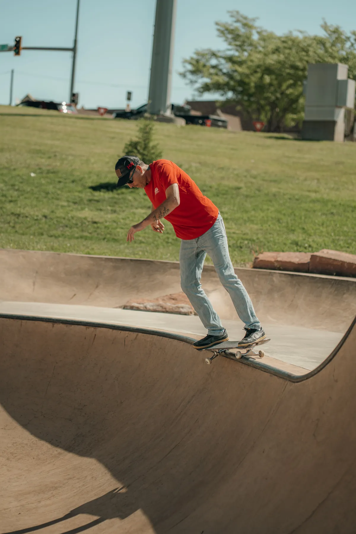 Rail trick captured mid-slide at a skate jam