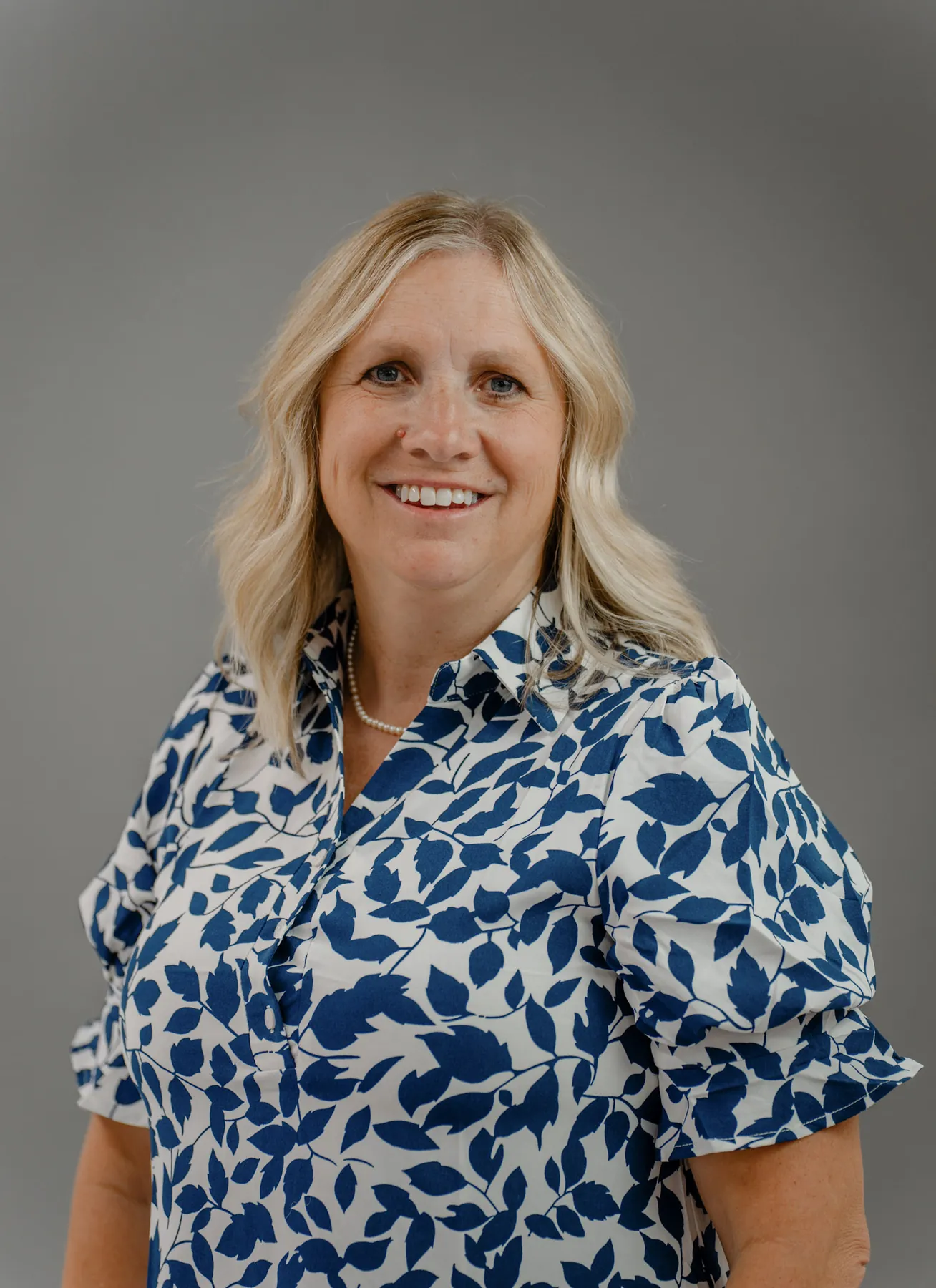 Professional headshot shot against a portable studio backdrop, Sioux Falls SD