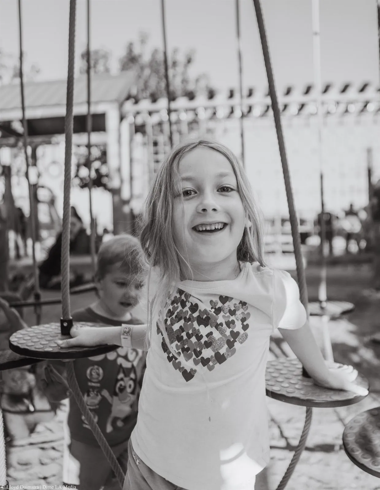 Kids laughing together at golden hour, family session