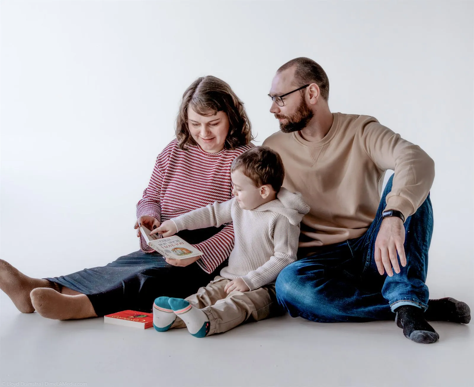 Family playing with blocks on the studio floor