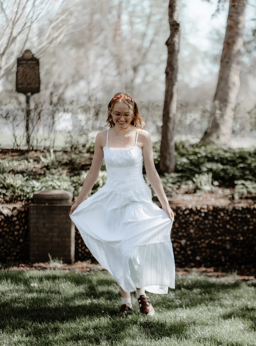 Syd Patzwald candid senior portrait walking in a Sioux Falls park