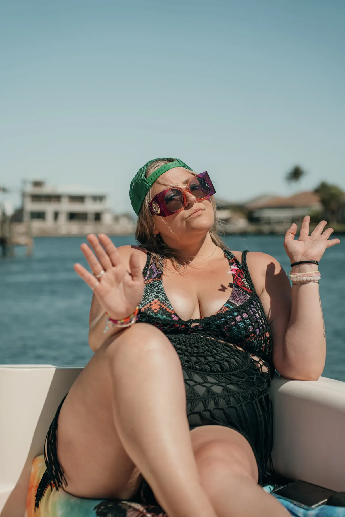 Resort portrait of a woman on a boat in the sun