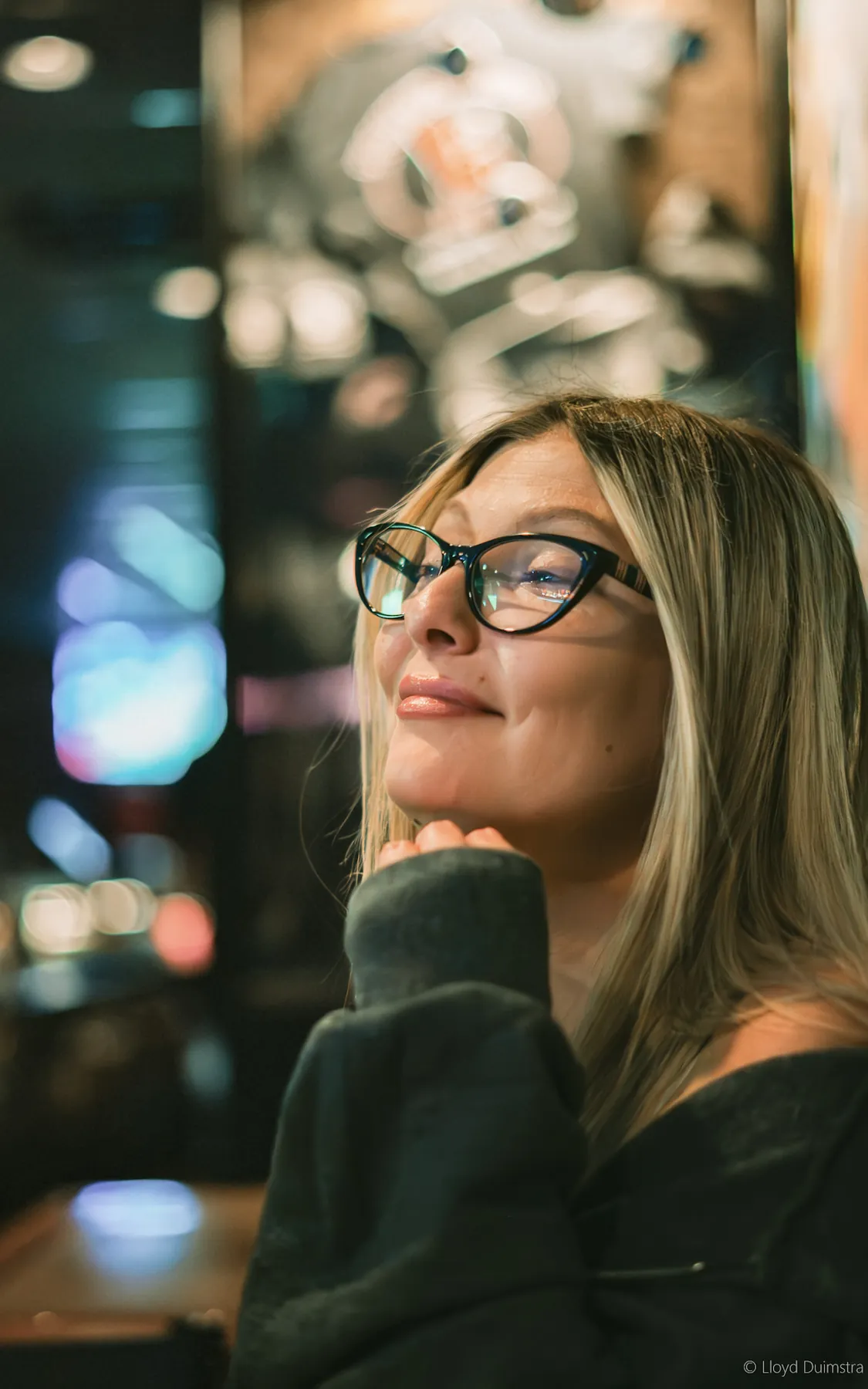 Candid portrait with warm neon bokeh, Sioux Falls SD