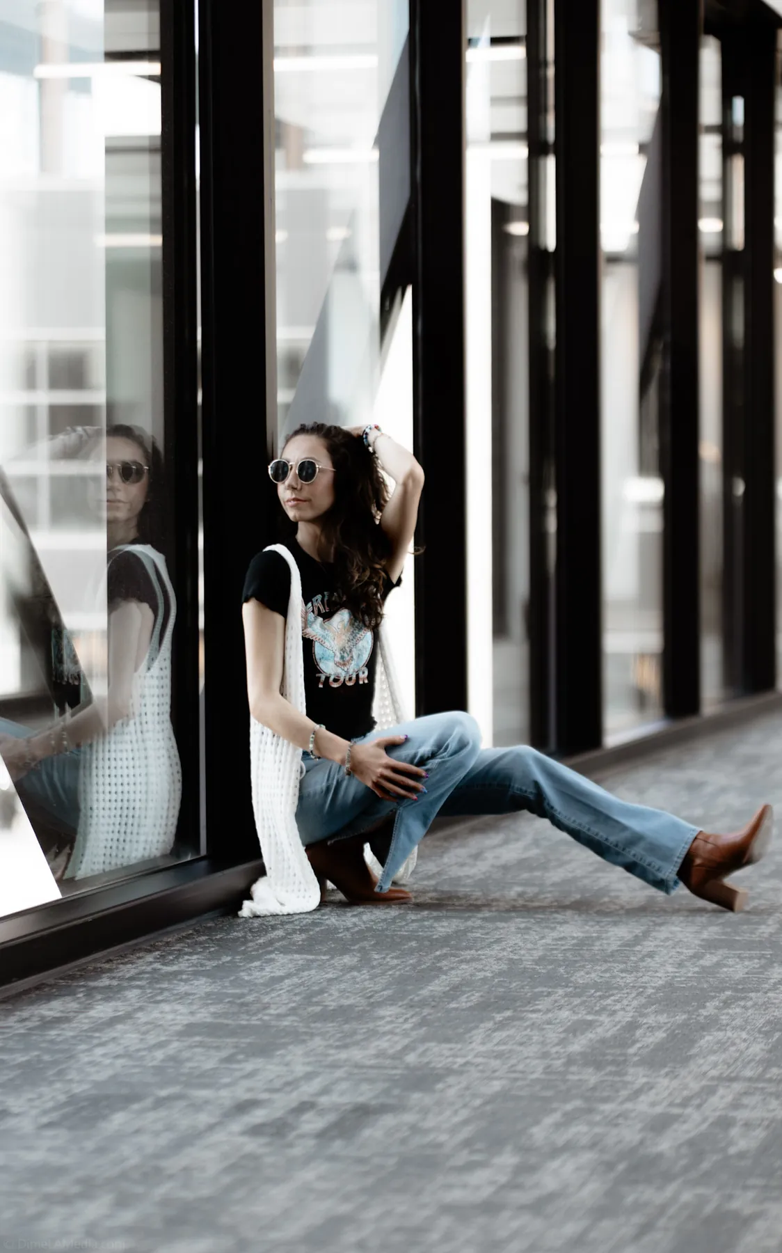 Portrait with window reflections in a downtown Sioux Falls skywalk