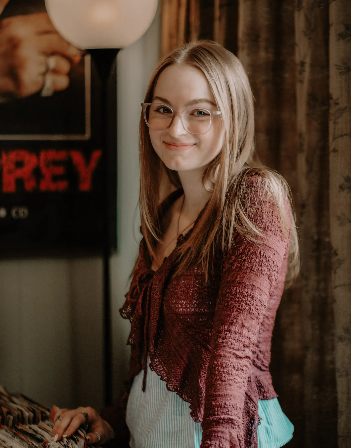 Syd Patzwald in a rust cardigan at a Sioux Falls record shop
