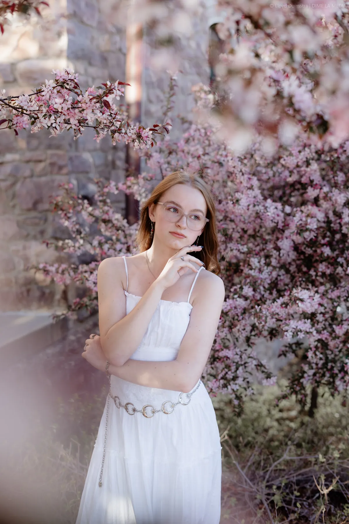 Syd Patzwald in spring blossoms, Sioux Falls senior photography