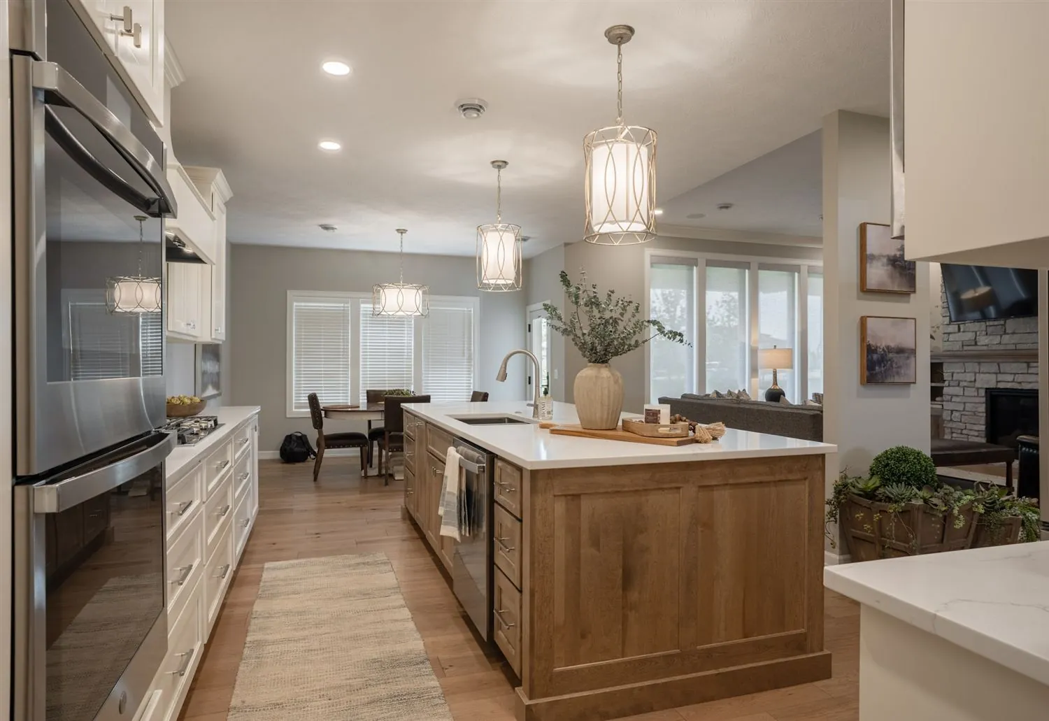 Long kitchen island with quartz counter, real estate photography Sioux Falls SD