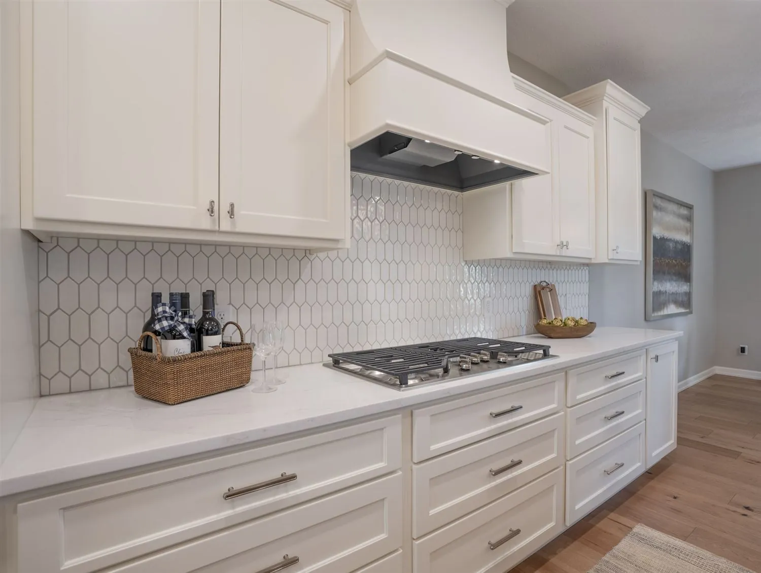 Gas cooktop and hex tile backsplash kitchen detail, real estate photography Sioux Falls SD