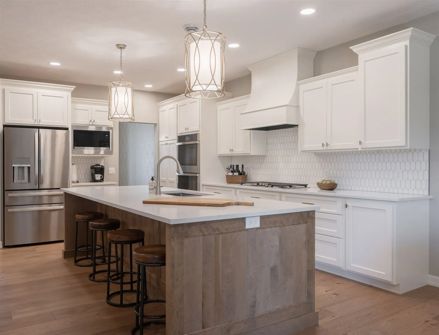 Kitchen with stainless appliances and island, real estate photography Sioux Falls SD