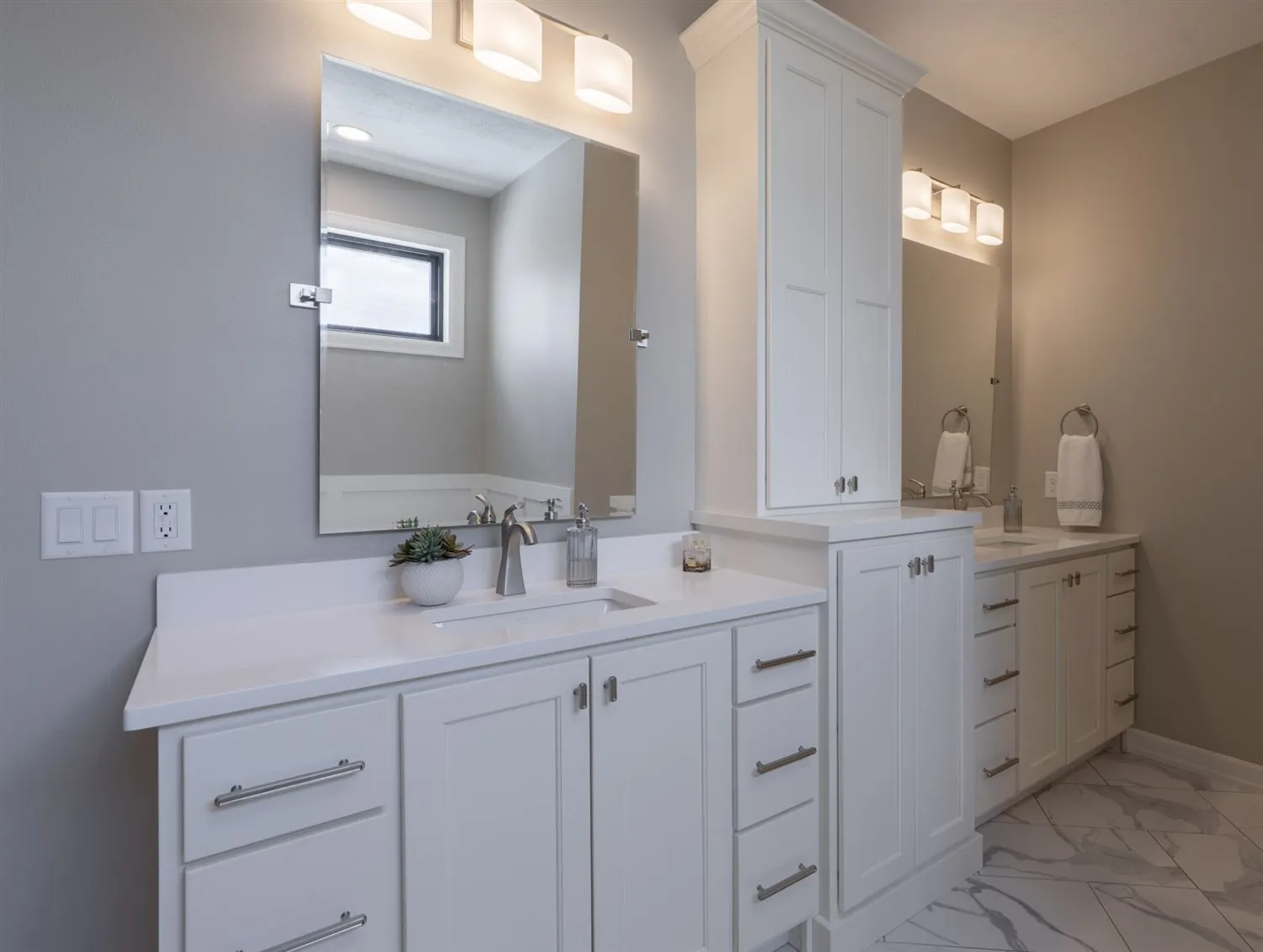 Double vanity with storage tower, real estate photography Sioux Falls SD