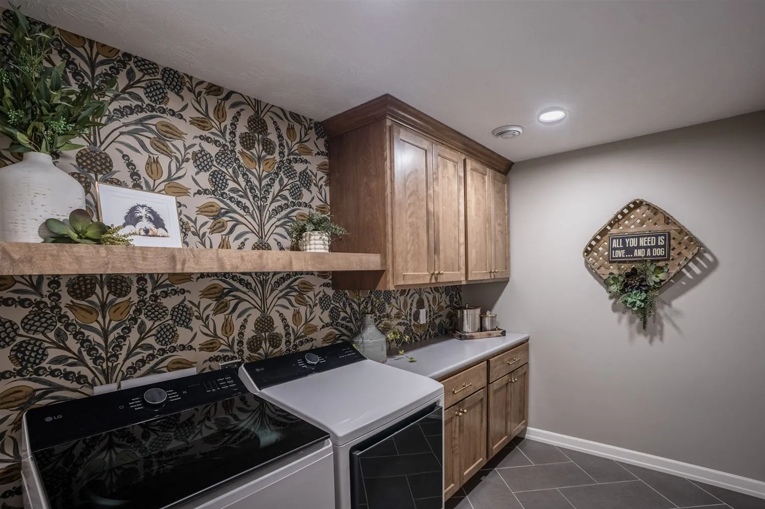 Laundry room with botanical wallpaper accent, real estate photography Sioux Falls SD